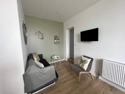 Télévision ou salle de divertissement dans l'établissement Gîte 49m2, 2 Chambres, Pro - Famille