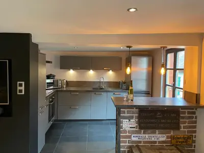 Cuisine ou kitchenette dans l'établissement Appartement chaleureux avec place de parking