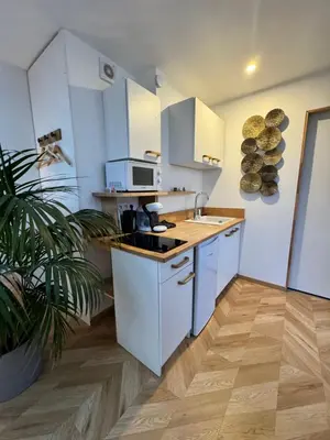Cuisine ou kitchenette dans l'établissement Ikigai
