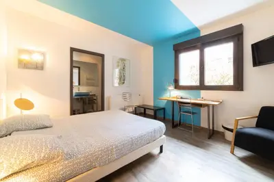 Un ou plusieurs lits dans un hébergement de l'établissement Maison Mondrian