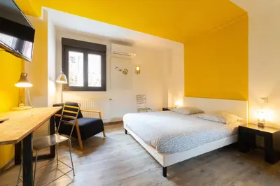 Un ou plusieurs lits dans un hébergement de l'établissement Maison Mondrian