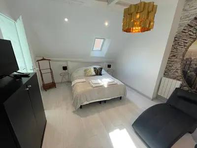 Un ou plusieurs lits dans un hébergement de l'établissement Esprit New York ........ au cœur de Mulhouse