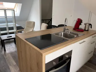 Cuisine ou kitchenette dans l'établissement Le 33 le Haut