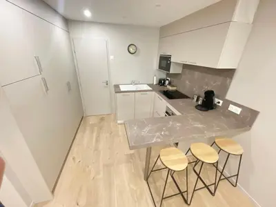 Cuisine ou kitchenette dans l'établissement Le Schongauer