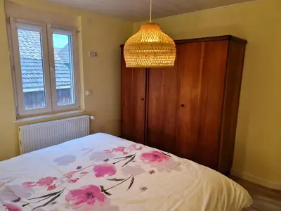 Un ou plusieurs lits dans un hébergement de l'établissement Les Chouchous du Ried 2