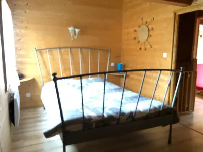 Un ou plusieurs lits dans un hébergement de l'établissement Chalet exposition plein sud
