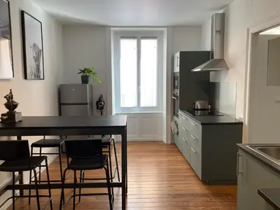 Cuisine ou kitchenette dans l'établissement Appartement avec place de parking et box vélos
