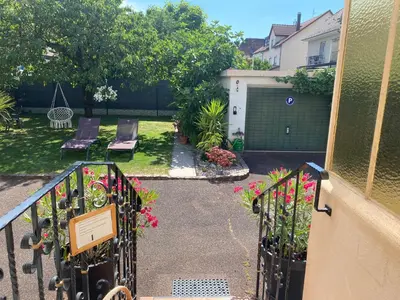 Jardin de l'établissement Appartement 3 lys