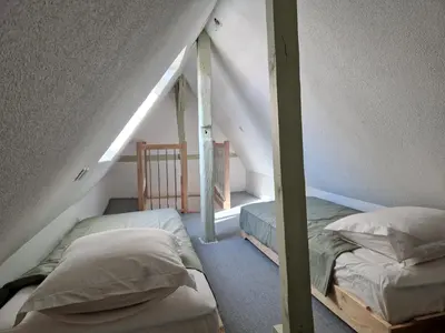 Un ou plusieurs lits dans un hébergement de l'établissement Home La Petite Porte - Petite Venise - Colmar