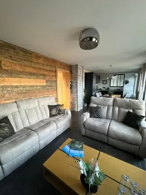 Coin salon dans l'établissement La reine appartement pour deux personnes avec magnifique vue et jacuzzi