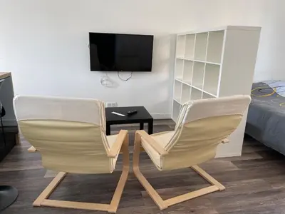 Télévision ou salle de divertissement dans l'établissement Le 33 L’Idéal
