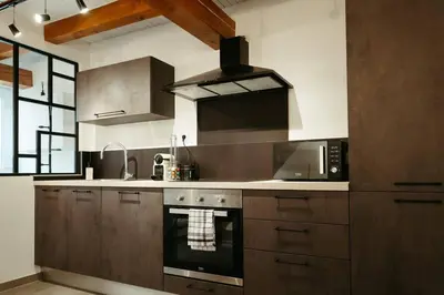 Cuisine ou kitchenette dans l'établissement La Villetta SPA -logement atypique