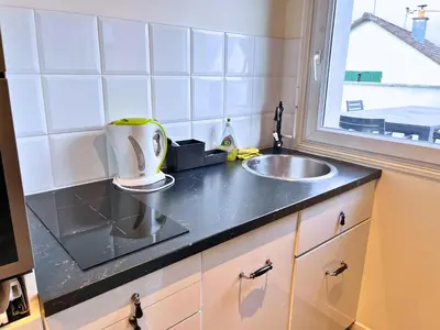 Cuisine ou kitchenette dans l'établissement Le Havre by Leslodgespa - Confort et élégance, terrasse privée, proche de l'aéroport et de Bâle