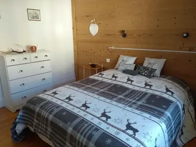 Un ou plusieurs lits dans un hébergement de l'établissement Cosy appartement La Bresse centre ville
