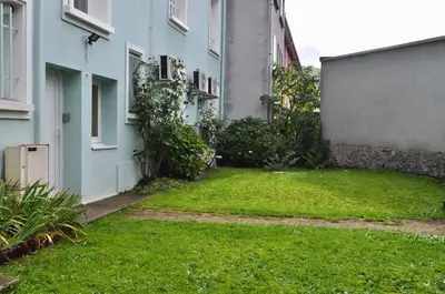Jardin de l'établissement Cosy appartement La Bresse centre ville