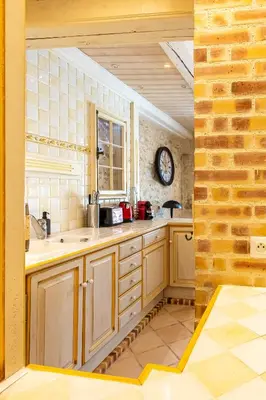 Cuisine ou kitchenette dans l'établissement Le 01-GregIMMO-Appart'Hôtel
