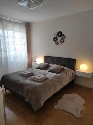 Un ou plusieurs lits dans un hébergement de l'établissement Appartements F3 Design Colmar+parking free