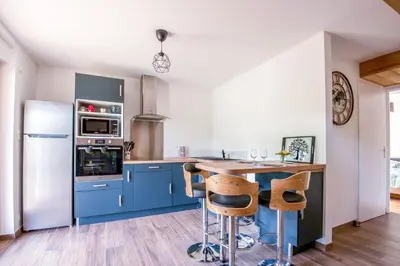 Cuisine ou kitchenette dans l'établissement Le Planois