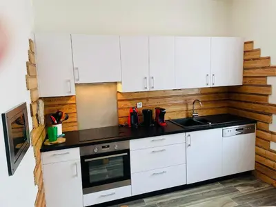 Cuisine ou kitchenette dans l'établissement Appt 50m2, 4 personnes, ménage, draps et serviettes inclus