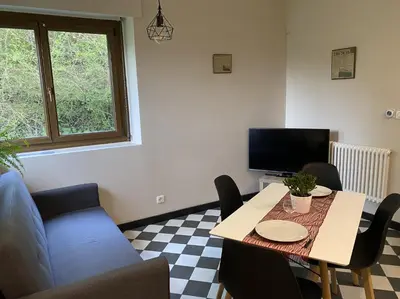 Coin salon dans l'établissement AILE DU CHATEAU 6 personnes