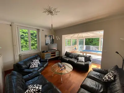 Coin salon dans l'établissement Magnifique villa à 5 minutes de Colmar