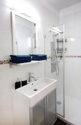 Salle de bains dans l'établissement L'instant T 4* Balnéo, Sauna et Parking Privé