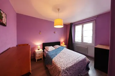 Un ou plusieurs lits dans un hébergement de l'établissement Appartement Rue du lac