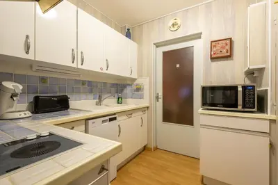 Cuisine ou kitchenette dans l'établissement Le Montagnard