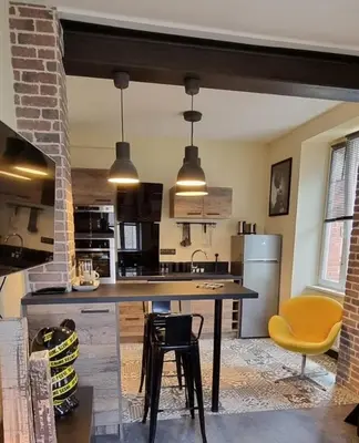 Cuisine ou kitchenette dans l'établissement villa l'Ambroisine