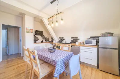 Cuisine ou kitchenette dans l'établissement Le Coteau de Sigo