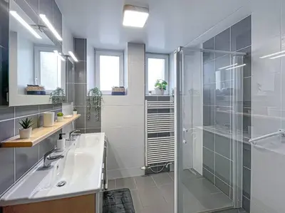 Salle de bains dans l'établissement Chez Minouche