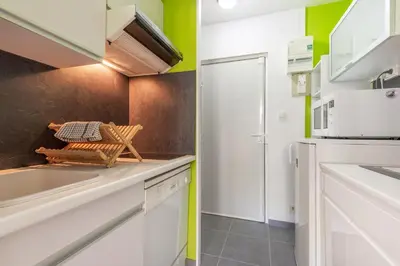 Cuisine ou kitchenette dans l'établissement L'Ourson des Myrtilles