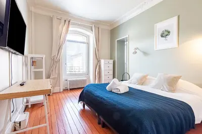 Un ou plusieurs lits dans un hébergement de l'établissement Les Libellules - Maison de caractère 5ch