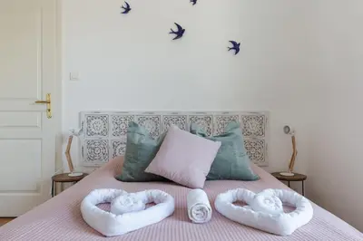 Un ou plusieurs lits dans un hébergement de l'établissement Travel Homes - The Nils, Cosy & cute with Parking