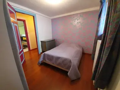 Un ou plusieurs lits dans un hébergement de l'établissement Gîte Lilas, LOFT 2 à 8 personnes, avec salle de jeux et SPA dans la résidence