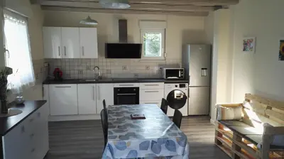 Cuisine ou kitchenette dans l'établissement Vie et Passion