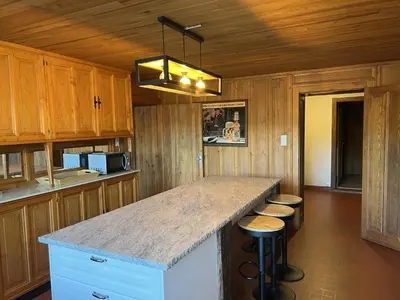Cuisine ou kitchenette dans l'établissement La Ferme des 3 lacs
