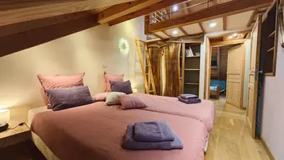 Un ou plusieurs lits dans un hébergement de l'établissement Colmar Friends and Familly guest home - ALL INCLUSIVE - COLMAR Gare - Jardin - Combles et Vous