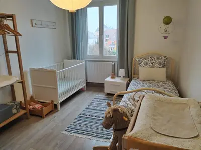 Un ou plusieurs lits dans un hébergement de l'établissement Colmar Friends and Familly guest home - ALL INCLUSIVE - COLMAR Gare - Jardin - Combles et Vous
