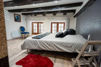 Un ou plusieurs lits dans un hébergement de l'établissement Appartement des chevaliers - Designed by C.M