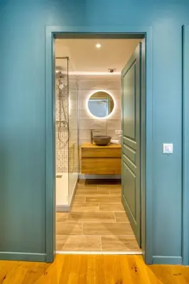 Un ou plusieurs lits dans un hébergement de l'établissement Appartement Le Verdoyant hyper centre avec Parking et Sauna