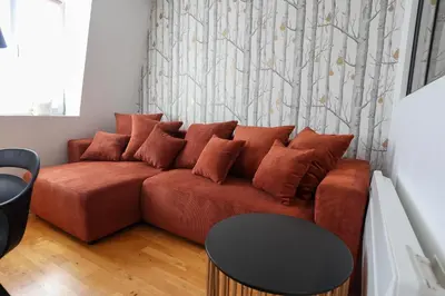 Coin salon dans l'établissement Appartement Le Verdoyant hyper centre avec Parking et Sauna