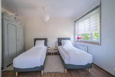 Un ou plusieurs lits dans un hébergement de l'établissement Cosy Home in South Alsace for work and leisure