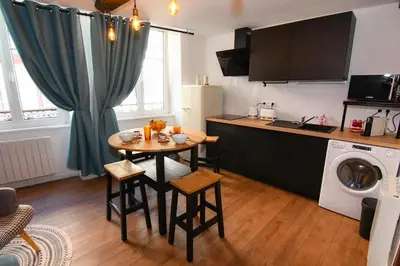 Cuisine ou kitchenette dans l'établissement Au Fil du Temps