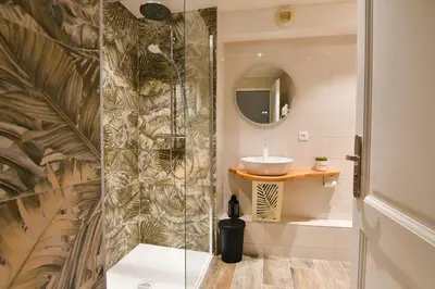 Salle de bains dans l'établissement Au Fil du Temps