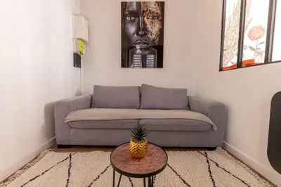 Coin salon dans l'établissement Appartement Cosy avec Jardin au Centre Historique de Sélestat & Proche Europa-Park