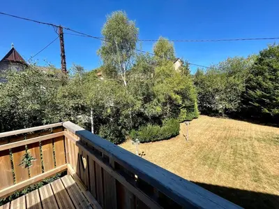 Jardin de l'établissement Chalet Kelly, centre ville / Jacuzzi / Sauna