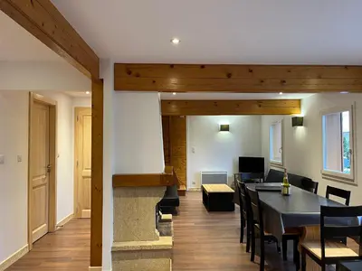 Coin salon dans l'établissement Chalet Gentiane