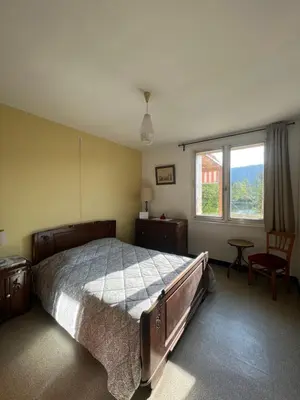 Un ou plusieurs lits dans un hébergement de l'établissement La maison et l'étang de pêche