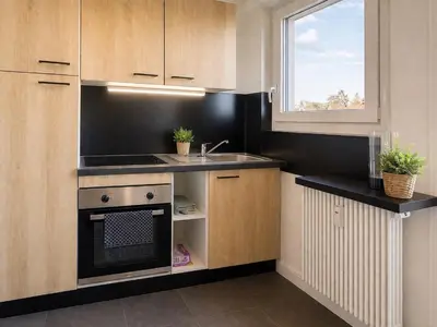 Cuisine ou kitchenette dans l'établissement Studio 26 m2 à Mulhouse - Terrasse & Stationnement - Accès UHA & Tram